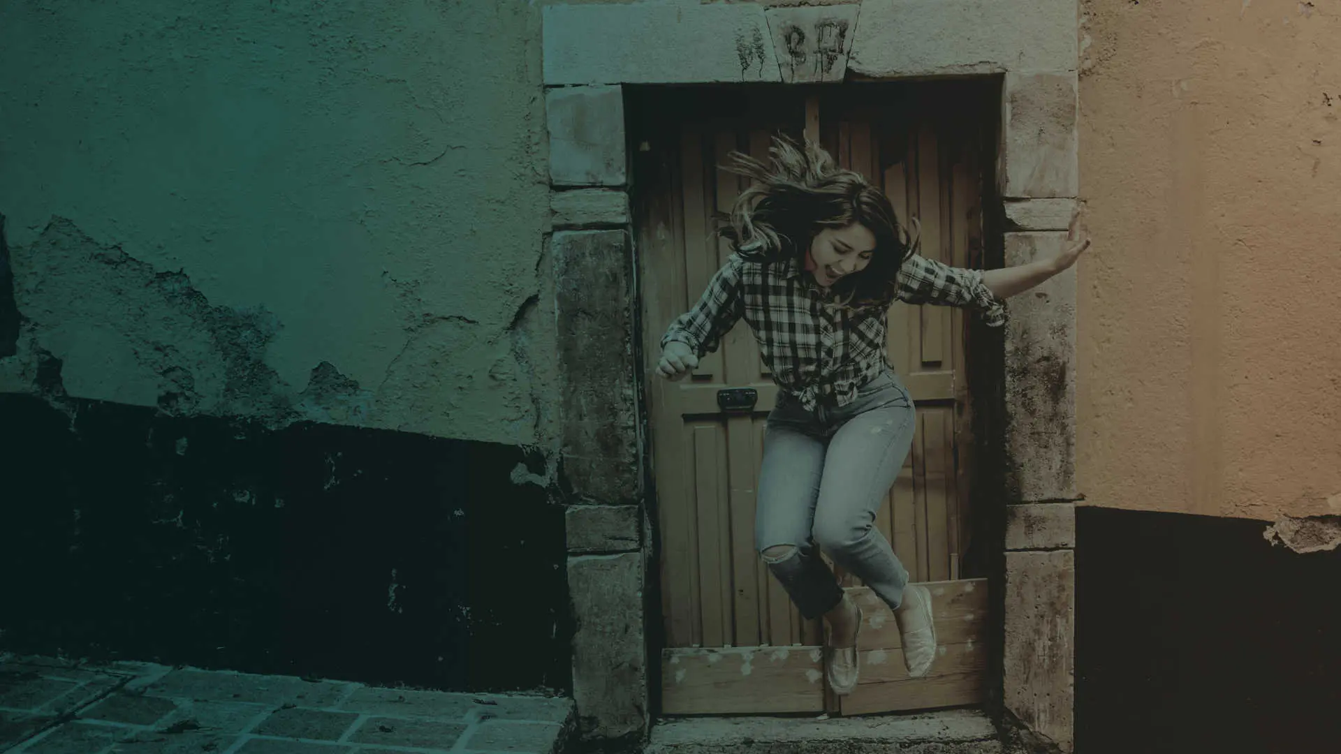 A young woman jumping for joy